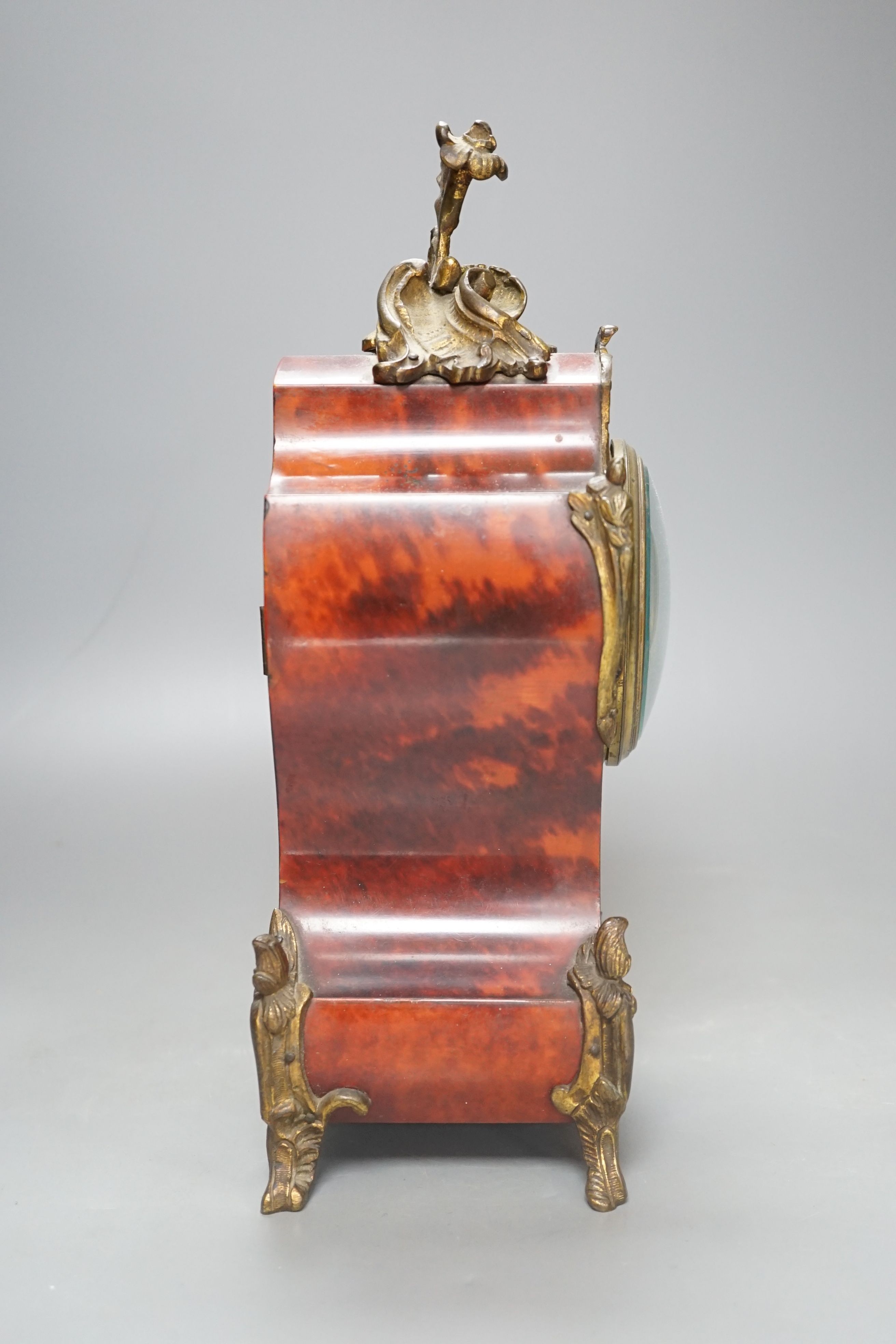 19th century French tortoiseshell veneered mantel clock, 31cms high.